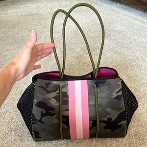 Camo tote with pink detailing and corded straps